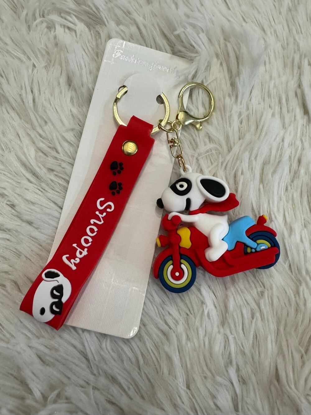 Snoopy on a motorcycle keychain with red strap super cute '